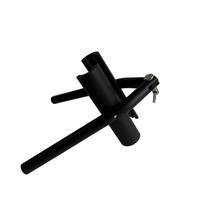 Black metal stand on a white surface with a gray background